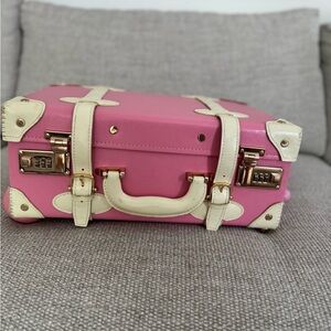 Steamline Luggage x Maisonette Pink Carry On